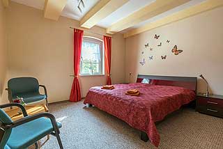 Schlafzimmer 1 mit Doppelbett